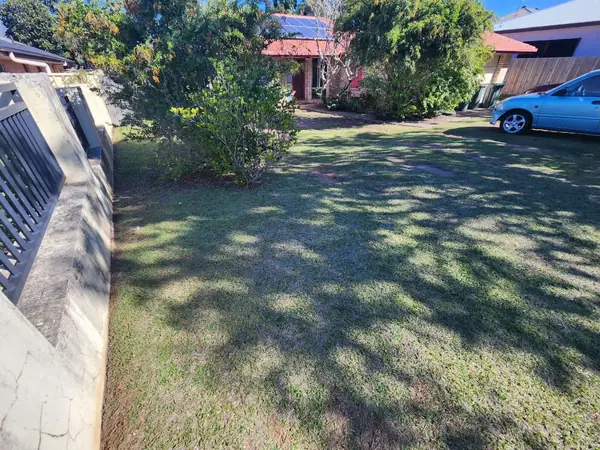 Front lawn and driveway frontage mown to a tidy finish
